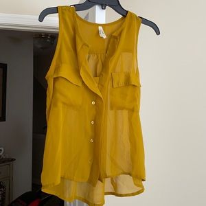 Mustard colored button down sleeveless blouse